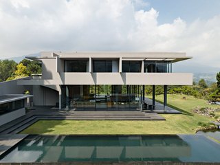Spacious|Creating spaciousness through the use of aluminium frames and large window glasses allows for the seamless integration of the indoor and outdoor environments. The combination of these materials not only maximizes natural light and views but also fosters an airy, open, and contemporary architectural design that enhances the overall sense of space within a building